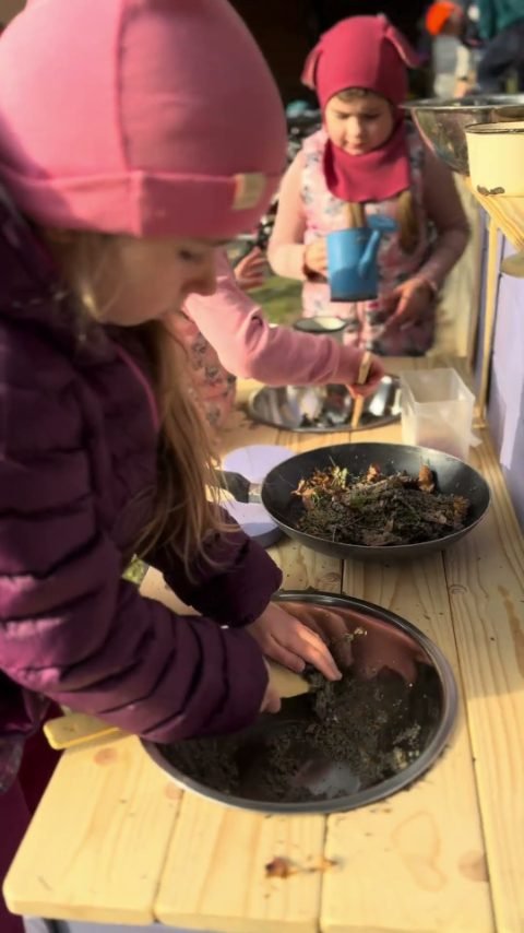 A close look at a handcrafted wooden mud kitchen during play